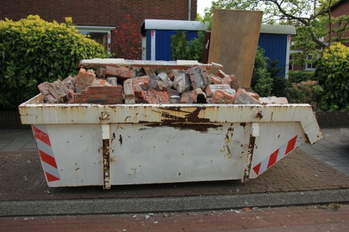 Construction site with waste disposal containers in Westminster