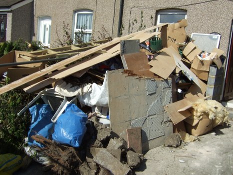 Waste being loaded into a skip